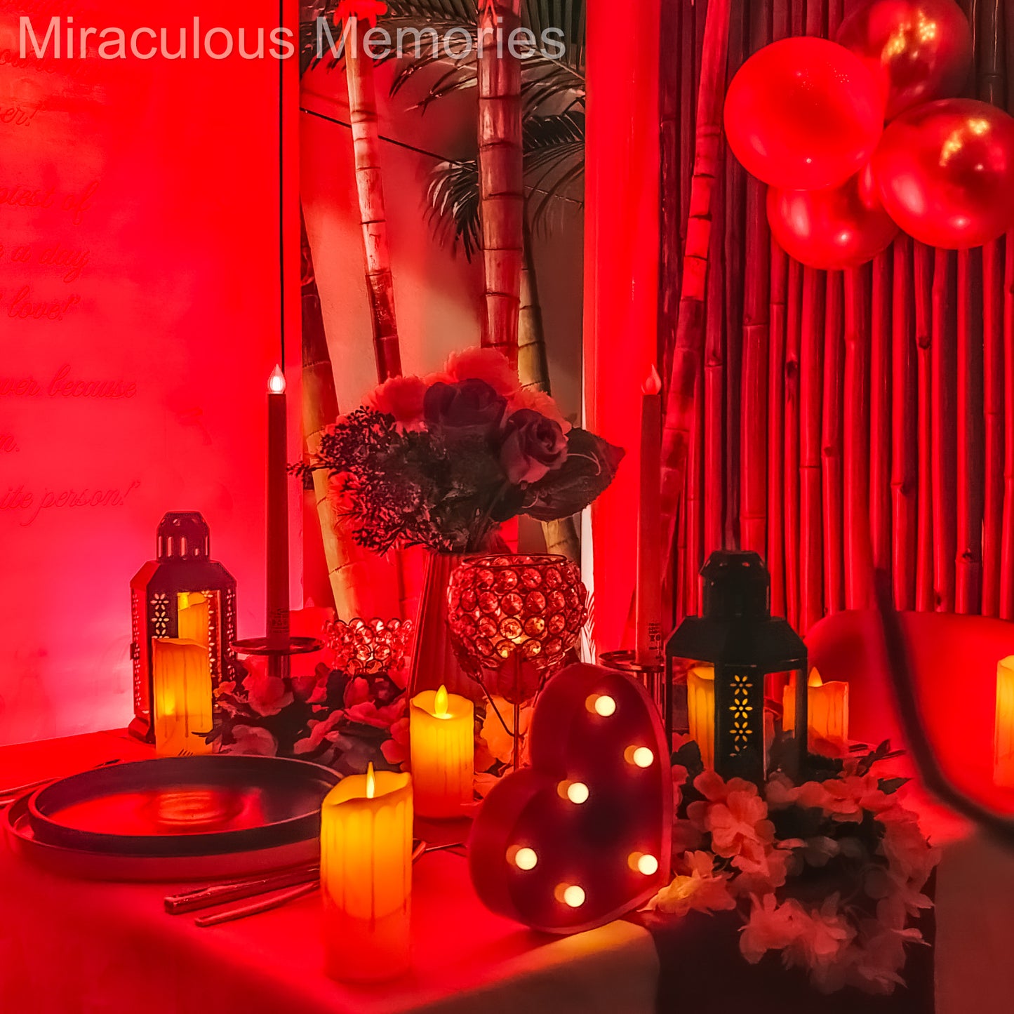 "Romantic table setup with candles, artificial flowers, and personal butler service for couples in Jubilee Hills."