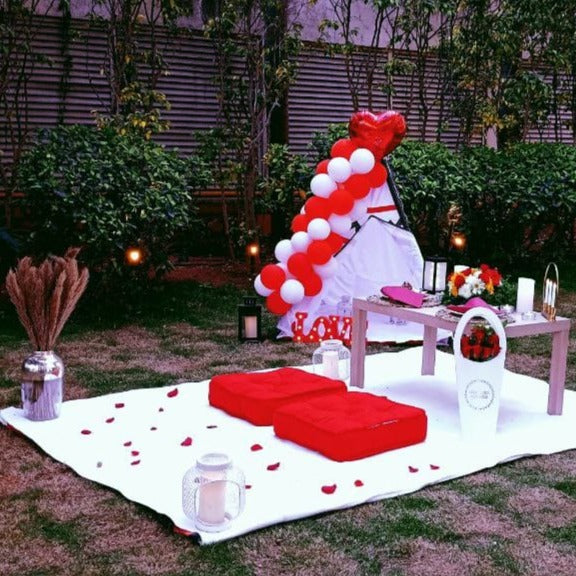 Red & White Theme Low Seating Special Candle Light Dinner for Couple In Hyderabad