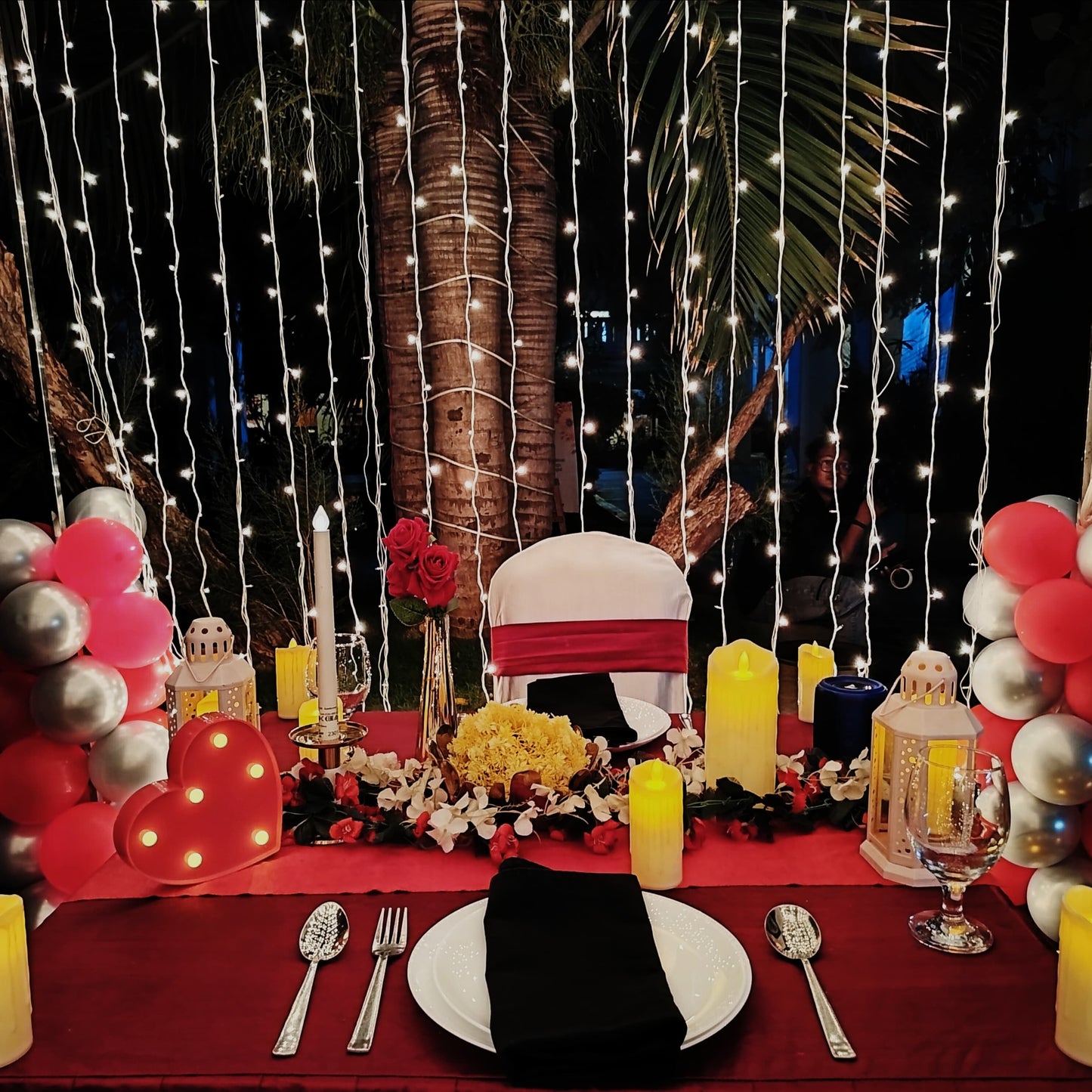 Candle light dinner in Hyderabad with a 5-course meal, personal butler, and romantic poolside ambiance.