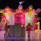 Stylish Barbie birthday decoration with pink balloon backdrop, star balloons, doll standees, and disco ball lights in Hyderabad.