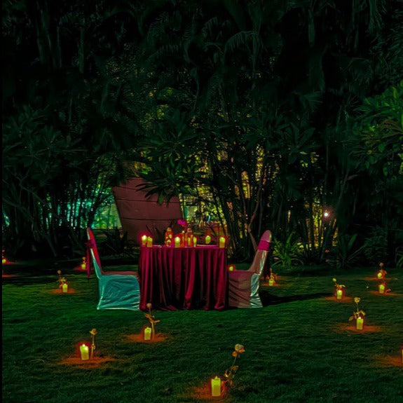"Exquisite anniversary celebration in Hyderabad featuring a premium candle light dinner under the stars."
