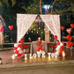Romantic candle light dinner setup in Hyderabad at Ellaa Hotel's open garden cabana, perfect for anniversaries.